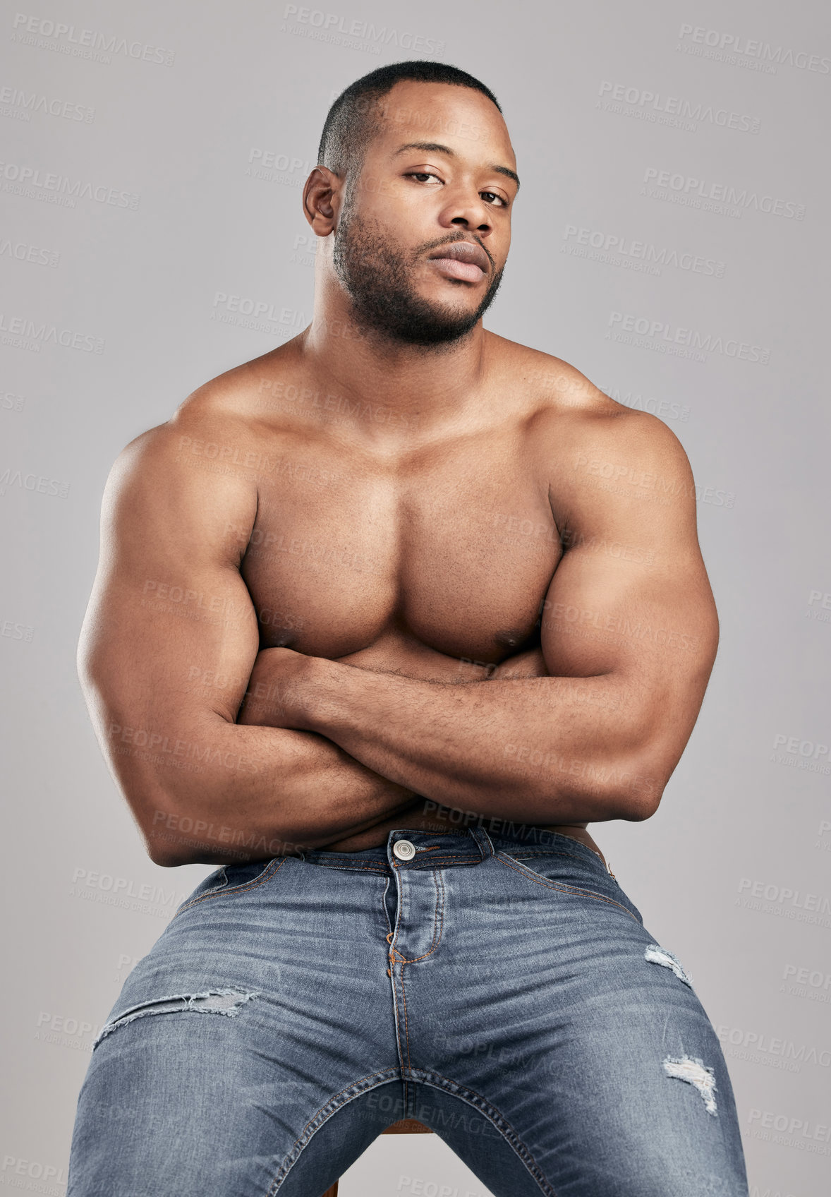 Buy stock photo Portrait, body muscle and confident black man in studio for fitness, exercise or health isolated on white background. Abdomen, shirtless or strong bodybuilder with arms crossed for sport in Nigeria