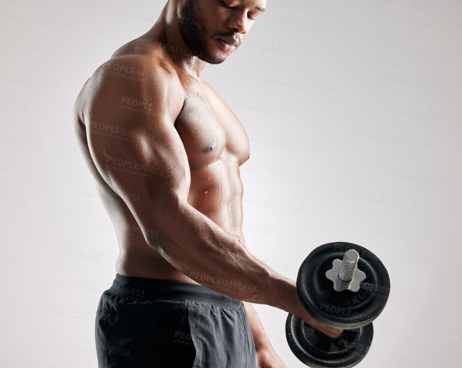 Buy stock photo Fitness, man and dumbbell in studio with muscles, bodybuilder and exercise for health and wellness training. Bicep, workout and weightlifting for strength or body goal, power and serious athlete