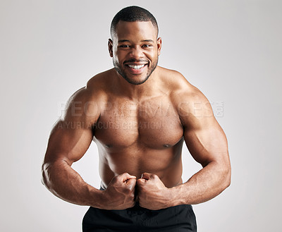 Buy stock photo Man, flexing and muscle portrait in studio, happy and confident or proud for workout training and exercise for body. White background, mock up and bodybuilder for sports, health and fitness goal