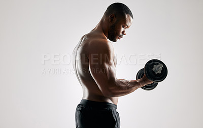 Buy stock photo Man, studio and workout with weights for training for healthy living or fitness and committed on white background. Equipment, muscles and dumbbells for gym to exercise for wellness, self care or body