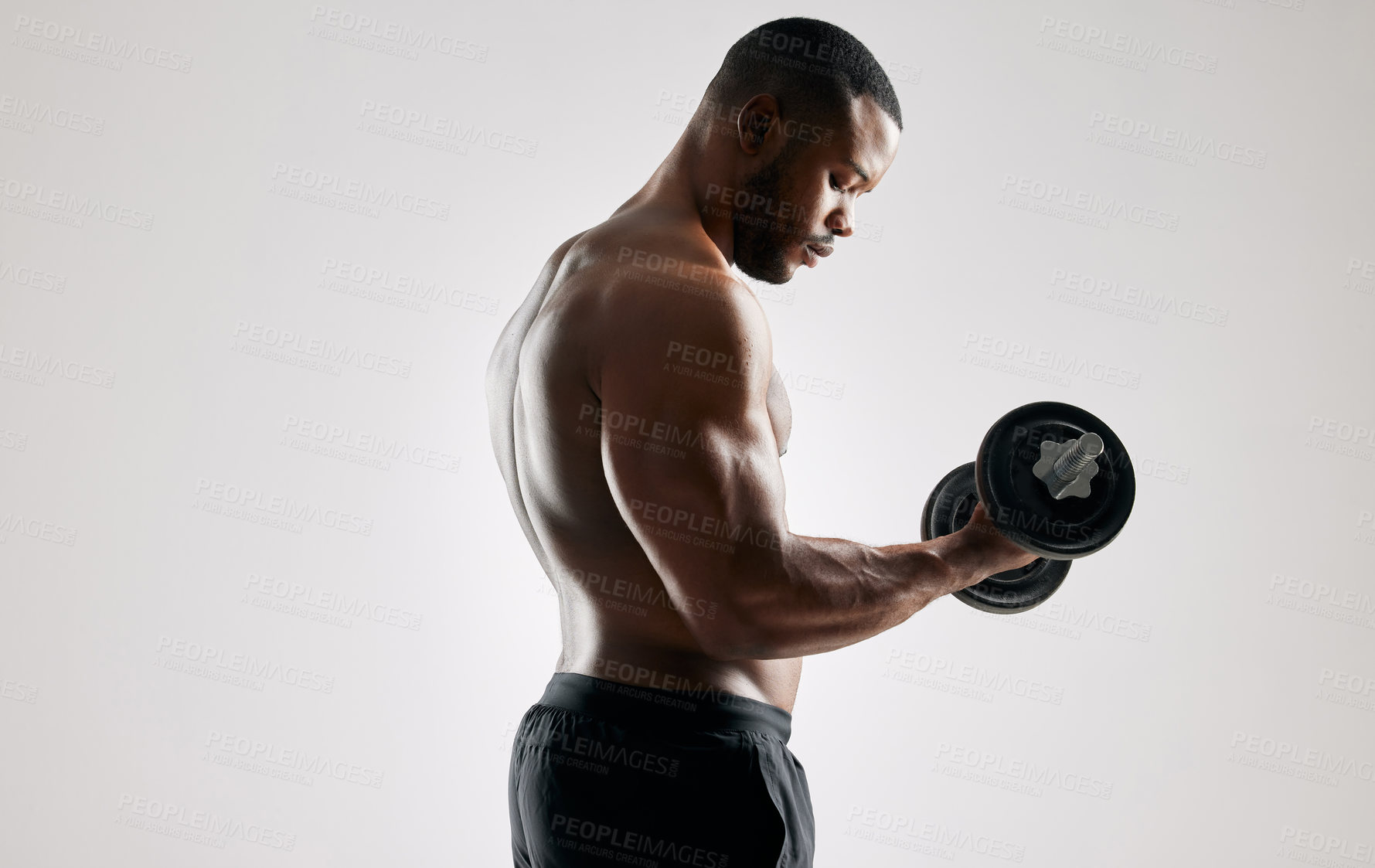 Buy stock photo Man, studio and workout with weights for training for healthy living or fitness and committed on white background. Equipment, muscles and dumbbells for gym to exercise for wellness, self care or body