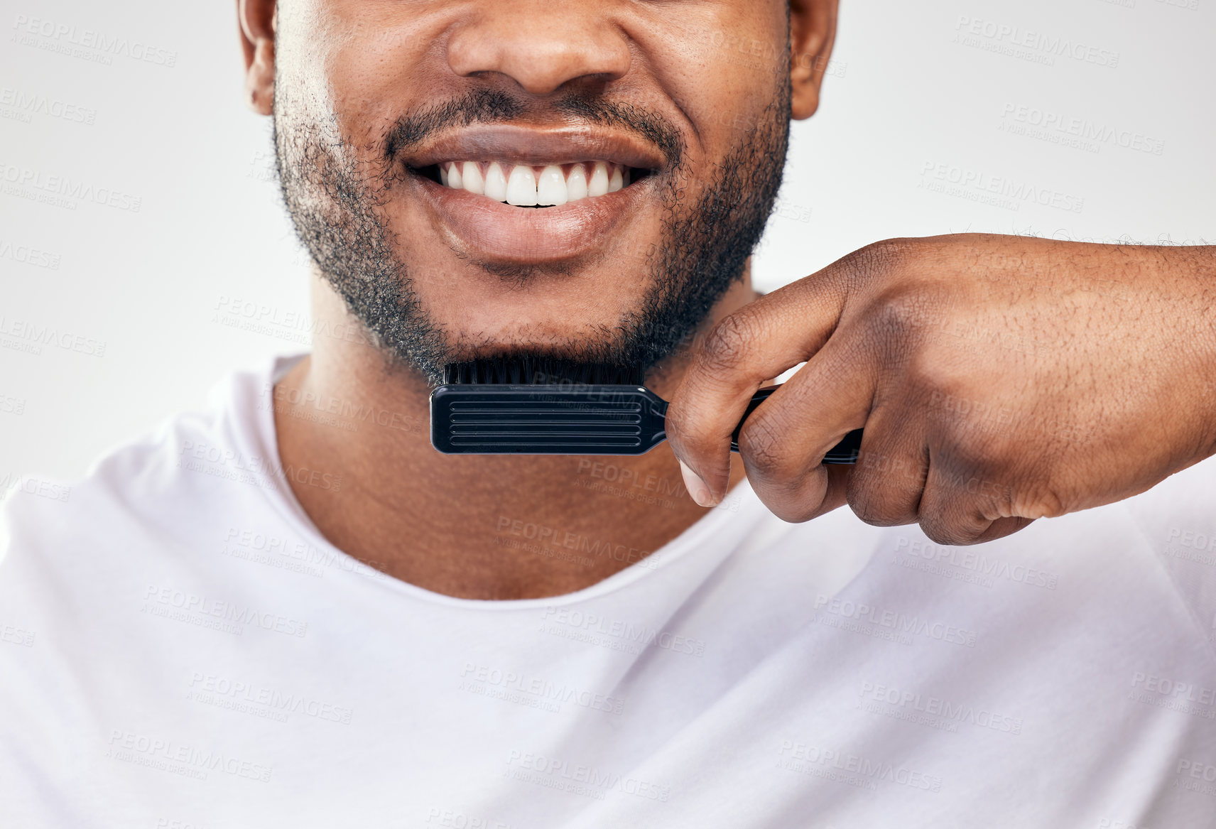 Buy stock photo Man, hands and beard hair or brush for morning grooming or  beauty self care in studio, cleaning or hygiene. Male person, smile and routine on white background for transformation, wellness or comb