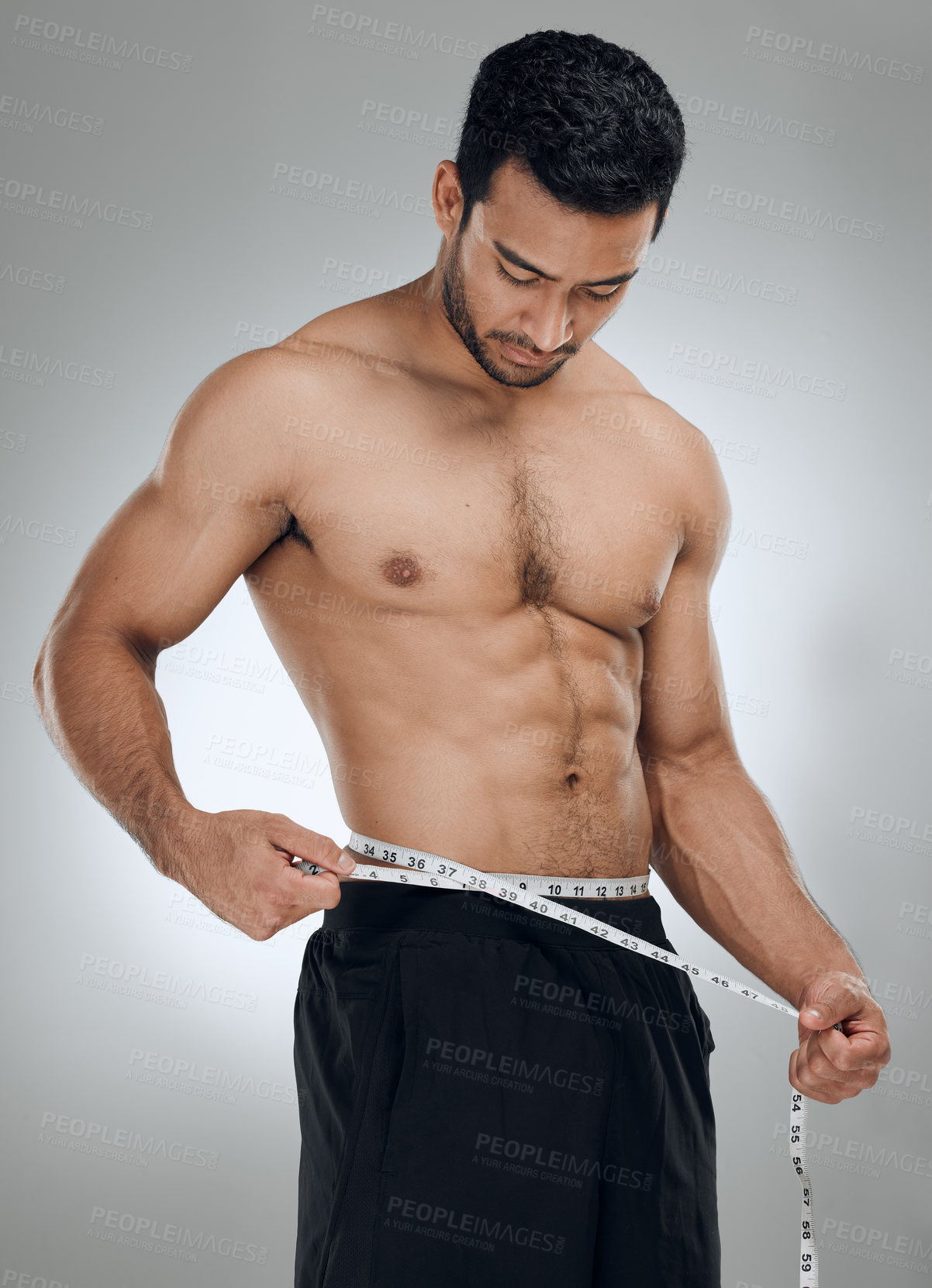 Buy stock photo Man, studio and measuring tape for fitness, weight loss and wellness with health and exercise. Guy, workout and results for training, body and diet with muscle and topless athlete on grey background