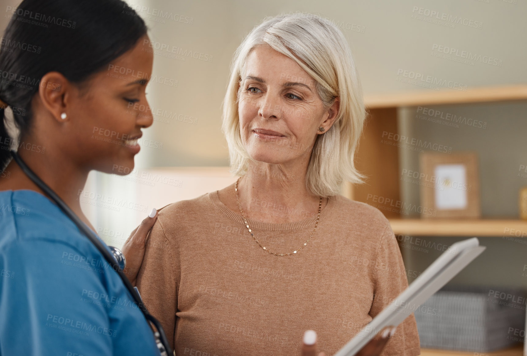 Buy stock photo Mature woman, nurse and tablet in clinic or hospital for healthcare or wellness with patient records. People, medic and tech for support, medicine or results as professional for cardiovascular exam