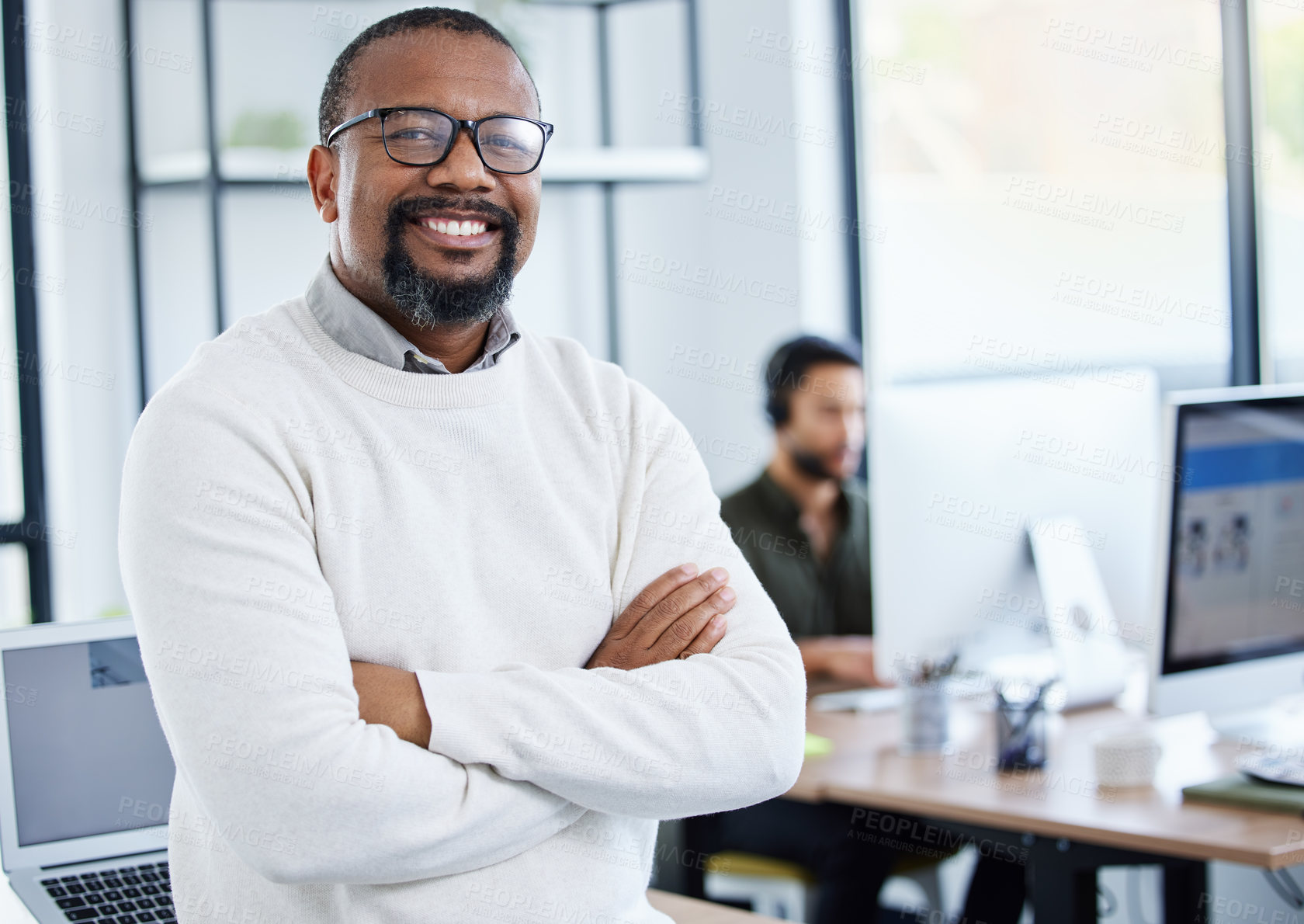 Buy stock photo Shot of a male businessman in his office