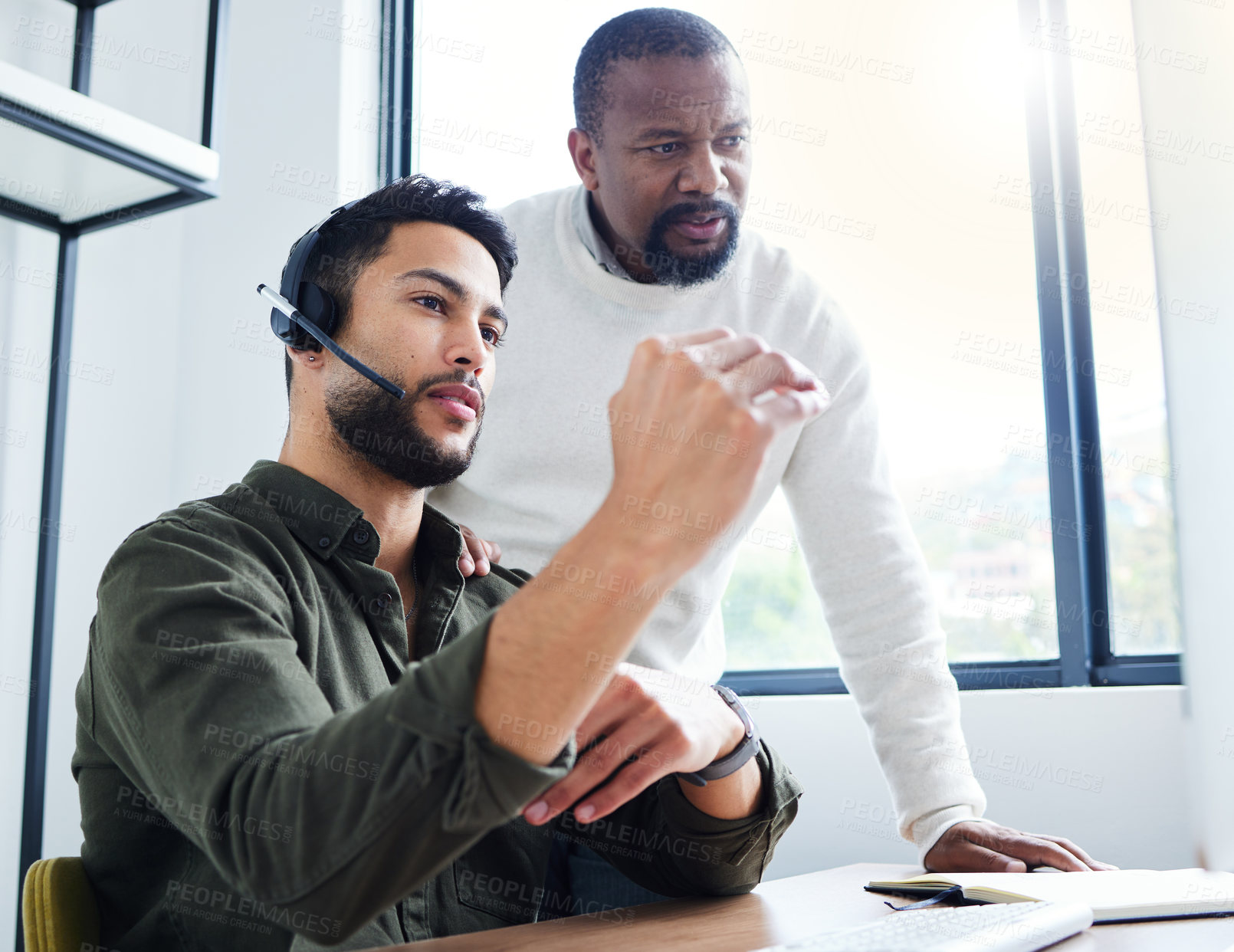 Buy stock photo Advice, opinion and man in call center with manager, computer and headset for lead generation in office. Telemarketing, virtual assistant or customer service consultant with mentor at help desk