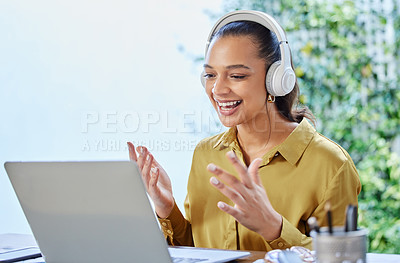 Buy stock photo Cropped shot of an attractive young businesswoman using her laptop to have an online meeting at home