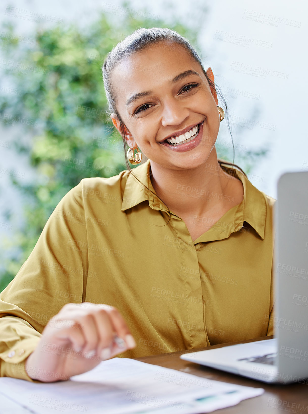 Buy stock photo Cropped portrait of an attractive young woman businesswoman working on her laptop at home