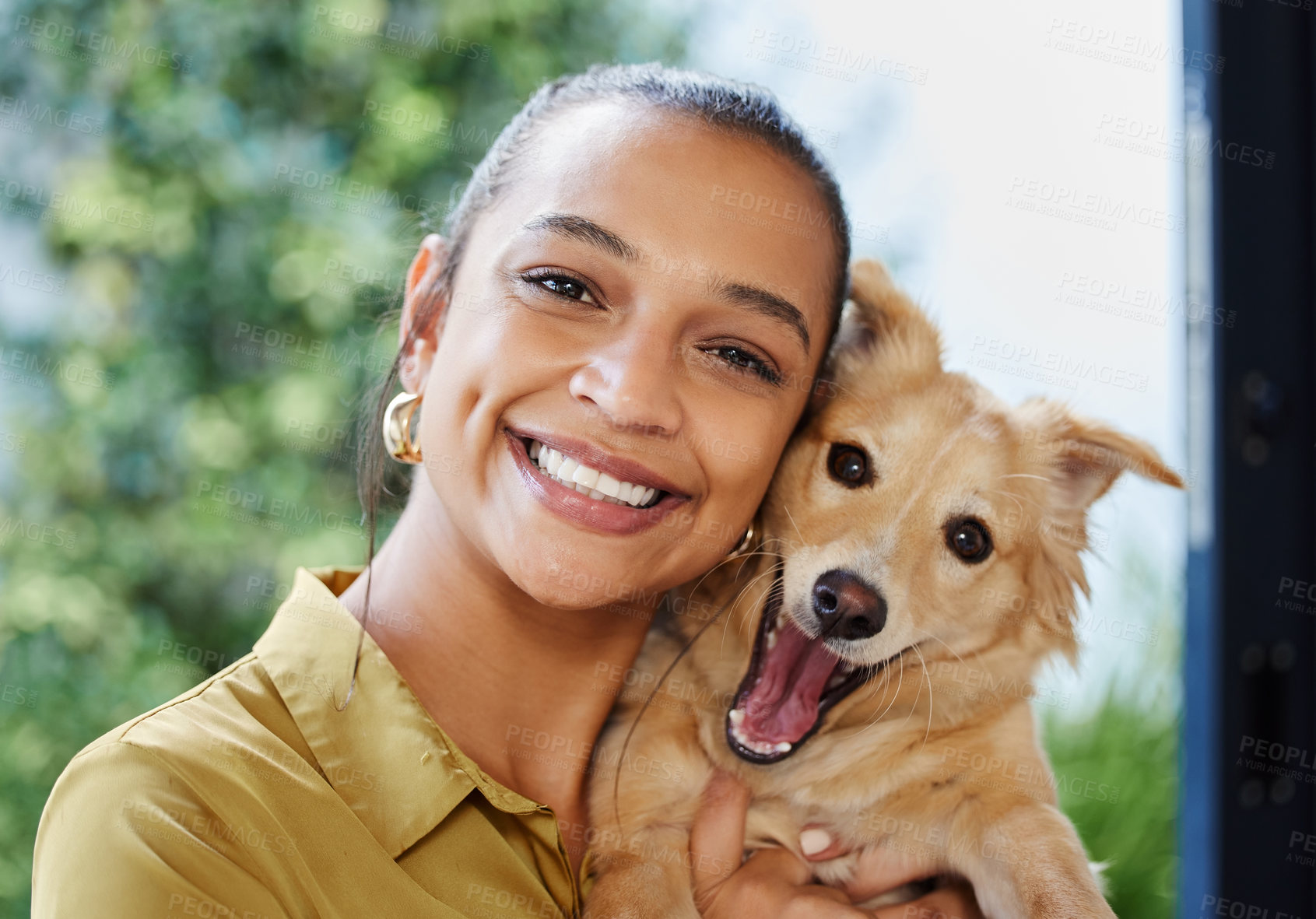 Buy stock photo Cropped portrait of an attractive young businesswoman and her adorable puppy at home