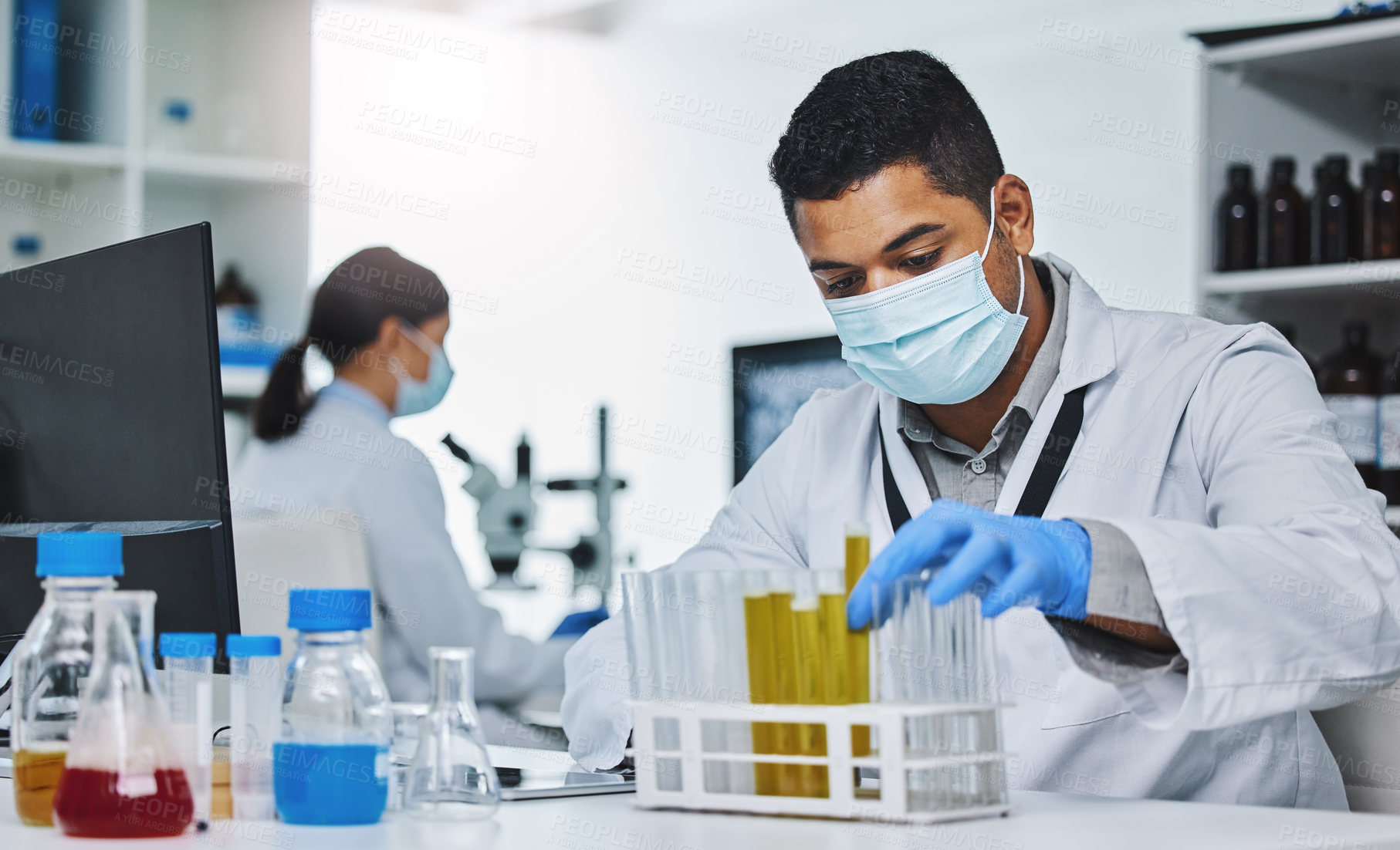 Buy stock photo Man, technician and medical research for covid 19, vaccine and test with mask in lab for pharmaceutical. Male person, scientist and pathology in healthcare for chemistry in forensic or investigation
