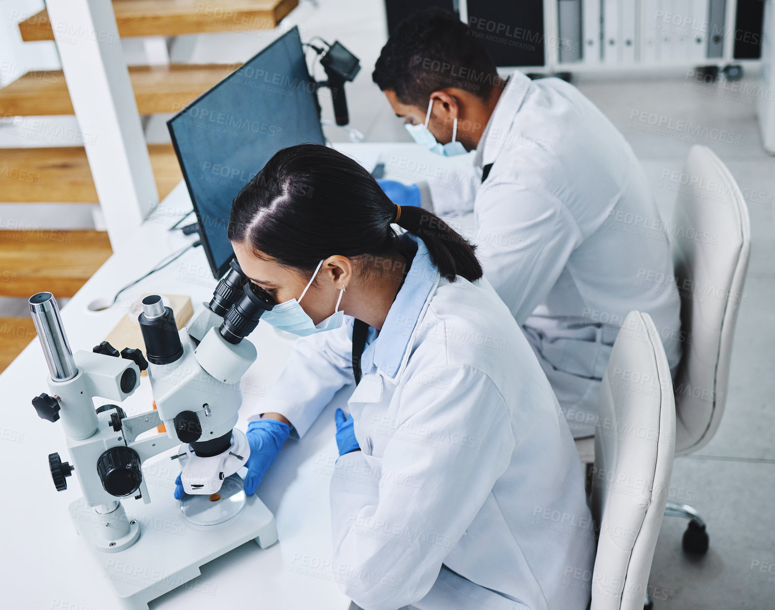 Buy stock photo Science, laboratory and scientists with microscope and computer for research, medical analysis and lab test. Healthcare, biotechnology and man and woman with equipment for sample, experiment and exam