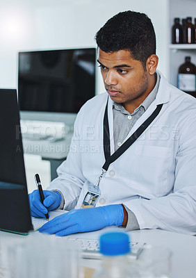 Buy stock photo Scientist man, writing and lab computer for medical notes, pharmaceutical report and research with data analysis. Young science expert, pc and paperwork for test, check and innovation in laboratory