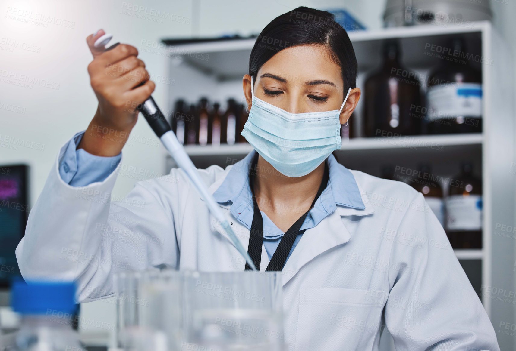 Buy stock photo Woman, technician and medical research for covid 19, vaccine and pipette with mask, lab for pharma innovation. Female person, scientist and sample in healthcare for chemistry in forensic for results
