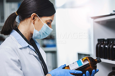 Buy stock photo Scientist, woman and product for hygiene in hospital for biotechnology research, experiment and safety with chemicals. Assistant, glass and liquid for test solution, equipment or chemist of health