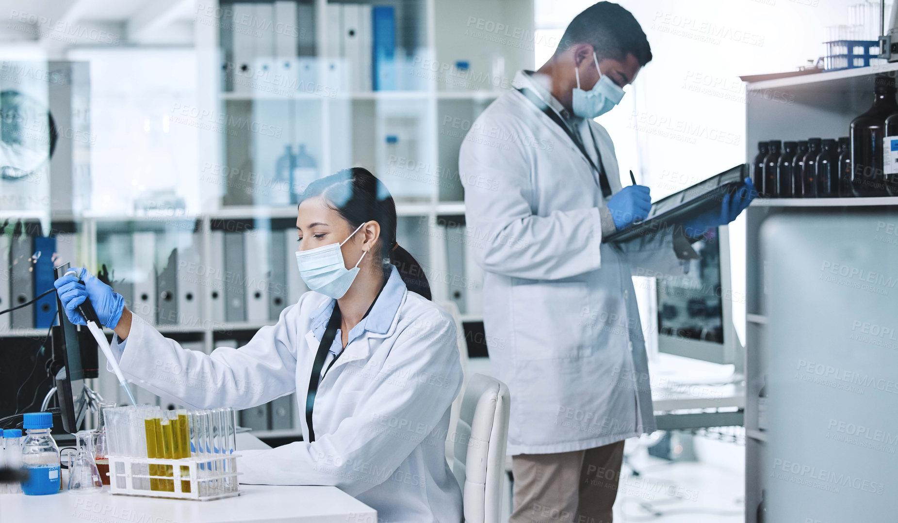 Buy stock photo People, face mask and science or research team, medical laboratory and innovation or healthcare employee. Vaccine, pharmaceutical study and chemical experiment, test tube and scientists with lab coat