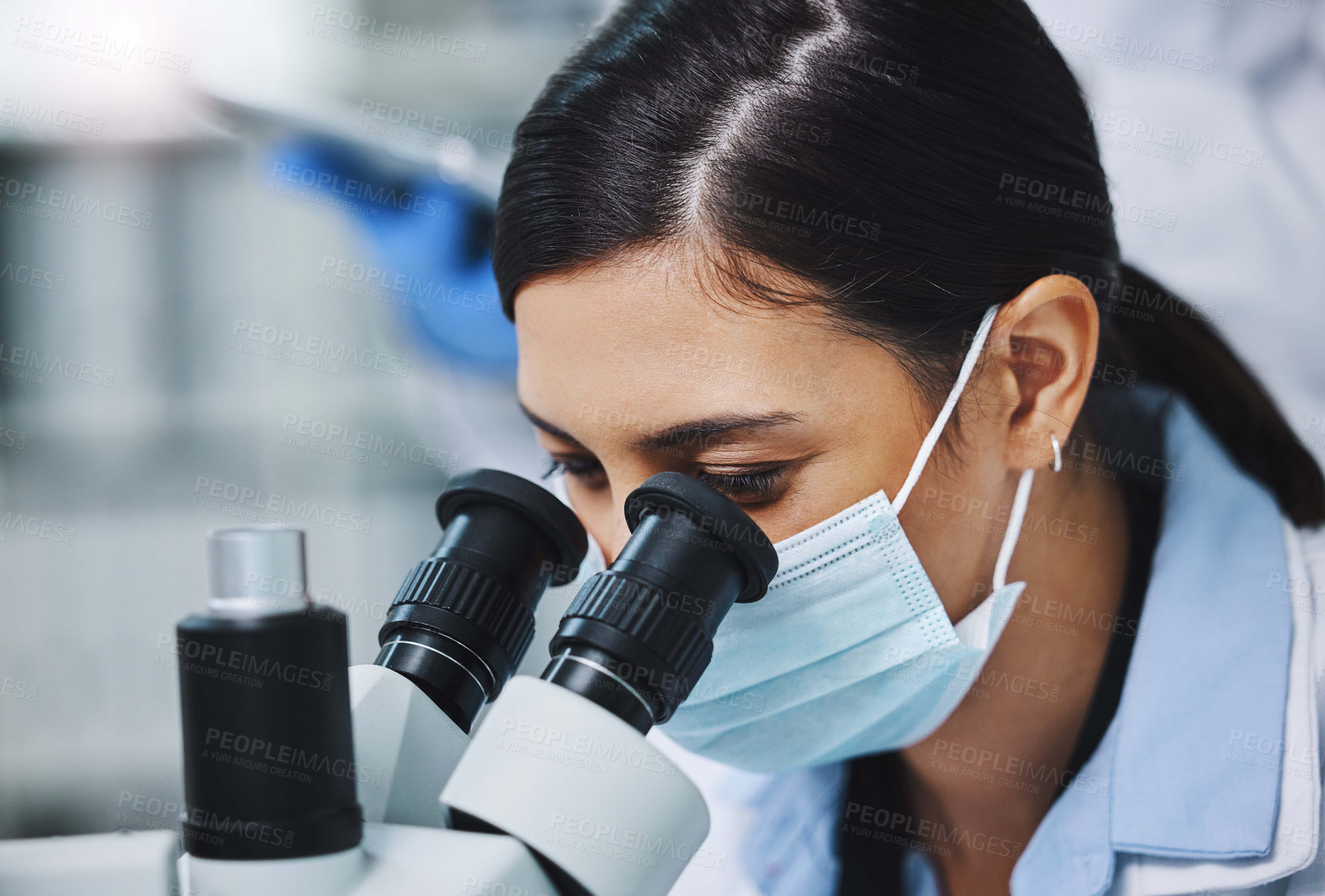 Buy stock photo Science, face mask and woman with microscope for medical analysis, research and lab test. Laboratory, biotechnology and female scientists with equipment for sample, experiment and examine virus