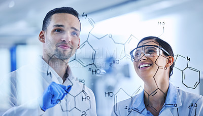 Buy stock photo Cropped shot of two young scientists working on a glass wipe board in their lab