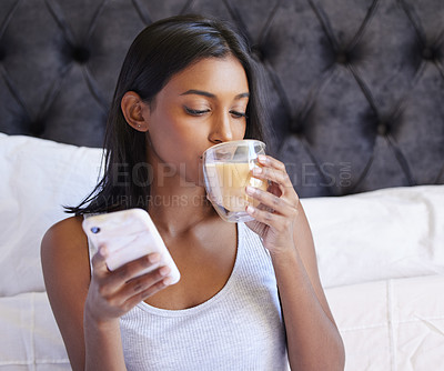 Buy stock photo Woman, coffee in bed and smartphone for morning routine, caffeine for energy and warm beverage with social media. Scroll, drink and network for internet, mobile app and using phone in bedroom at home