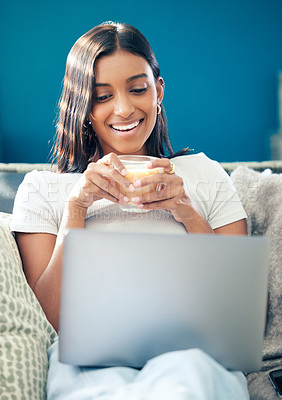 Buy stock photo Happy, sofa and woman on laptop with coffee for social networking, remote work and research. Working from home, business and person on computer for website, internet and email for freelance career