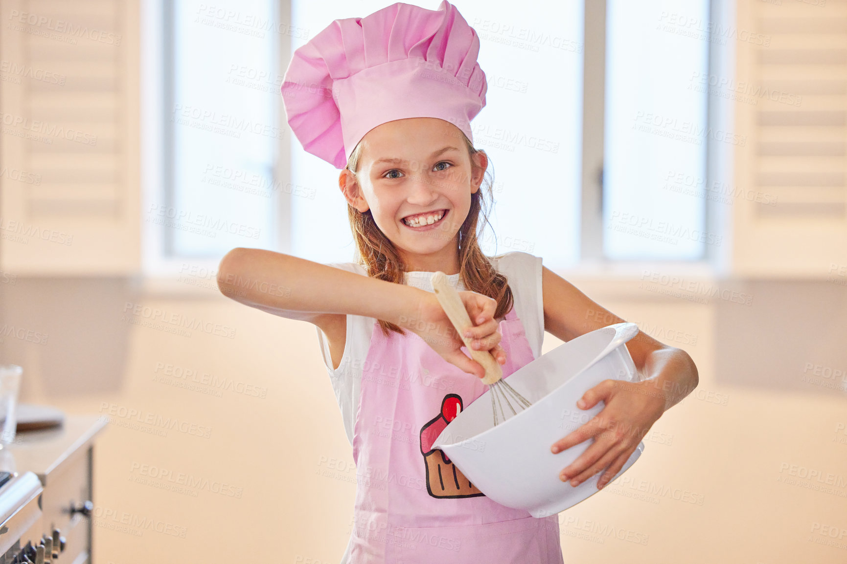 Buy stock photo Girl, portrait and baking in kitchen with chef hat for learning, child development and fun in house. Cooking, food or kid in baker costume for wellness, nutrition or brunch, cake or diy home cookies 