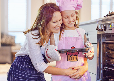 Buy stock photo Baking, family and kids at oven in kitchen together learning how to cook or prepare fresh pastry. Love, smile or happy with mother and girl child in home to bake cupcakes, ingredients or food