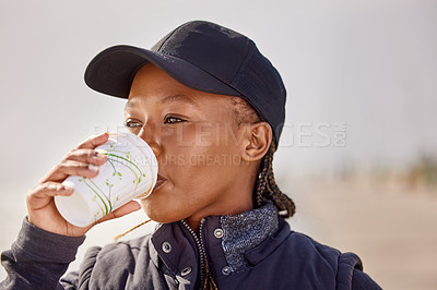 Buy stock photo Thinking, black woman and coffee for drinking outdoor for caffeine, increase energy and ideas. Outside, female person and planning for hiking adventure, holiday and vacation with beverage or tea