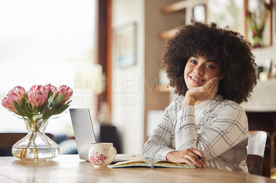 Buy stock photo Shot of a you woman working in the lounge at home