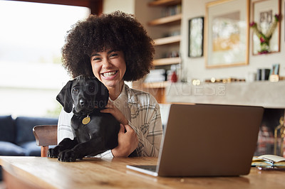 Buy stock photo Shot of a young woman playing with her dog at home