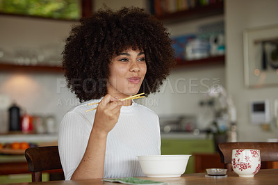 Buy stock photo Black woman, chopsticks and food for lunch in kitchen fine dining for healthy diet, experience or hunger. Female person, plate and asian cuisine or ramen in home for snack, nutrition and eating