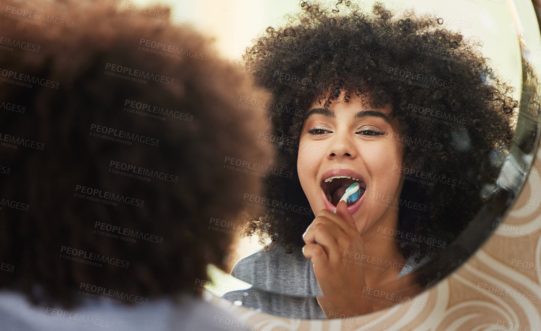 Buy stock photo Dental, mirror and woman brushing teeth in bathroom for health, wellness and self care in morning at home. Oral care, reflection and female person with mouth routine or treatment in apartment.