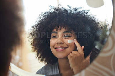 Buy stock photo Beauty, cream and skincare with woman in mirror for product, facial and cosmetics. Morning routine, reflection and self care with face of female person and lotion at home for sunscreen and glow