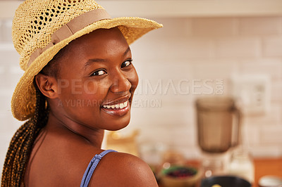 Buy stock photo African woman, sun hat and portrait in kitchen for cooking, relax and indoor recreation on weekend. Happy person, smile and mockup for morning routine, breakfast time or alone with joy for self care