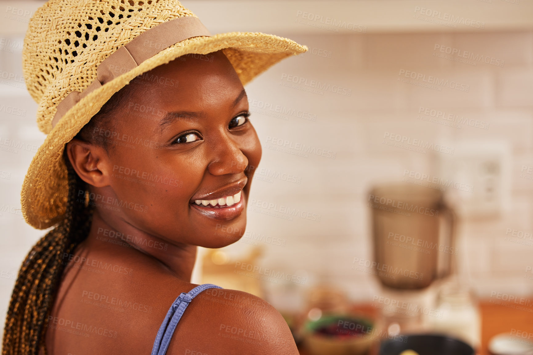 Buy stock photo African woman, sun hat and portrait in kitchen for cooking, relax and indoor recreation on weekend. Happy person, smile and mockup for morning routine, breakfast time or alone with joy for self care