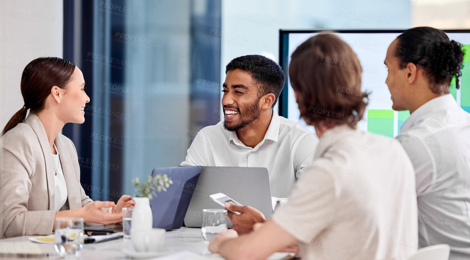 Buy stock photo Shot of a group of people in ameeting