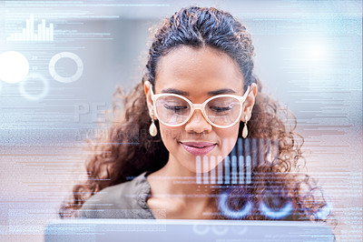 Buy stock photo Shot of a young businesswoman using a laptop at work