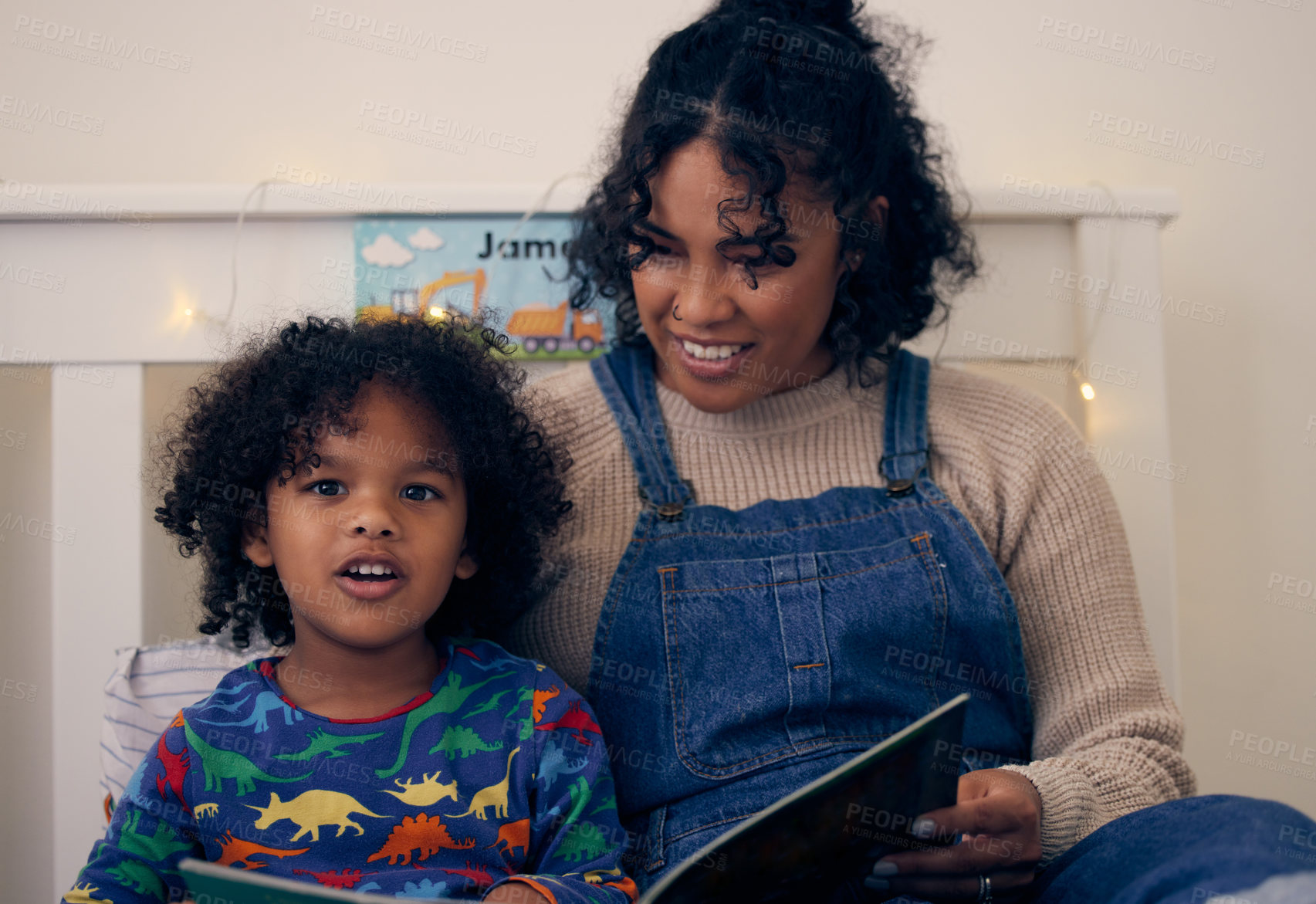 Buy stock photo Reading, book and portrait of kid with mom in bedroom, smile and cute child together with mother for love. Young boy, pyjamas and story time with woman, night and relax on weekend and happiness