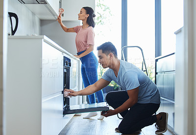 Buy stock photo Couple, house and spring cleaning in kitchen for teamwork with love, bonding and health with routine. Weekend, people and apartment for safety from bacteria with hygiene for fresh with care in Sweden