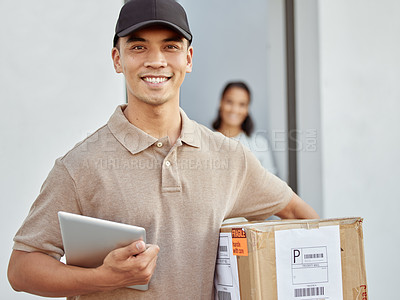 Buy stock photo Shot of a young delivery man delivering packages to a customer