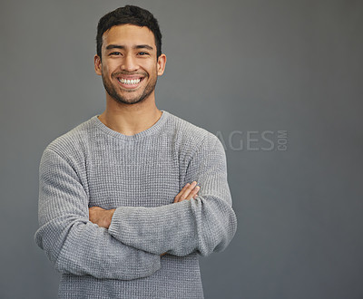 Buy stock photo Portrait of man with mockup, arms crossed and smile on studio backdrop in confident casual fashion promo. Relax, confidence and face of male on grey background with happiness, pride and mock up space