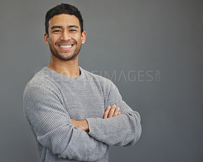 Buy stock photo Portrait of happy man in studio with mockup, arms crossed and smile on studio backdrop in casual fashion. Relax, confidence and face of male on grey background with happiness and pride with space.