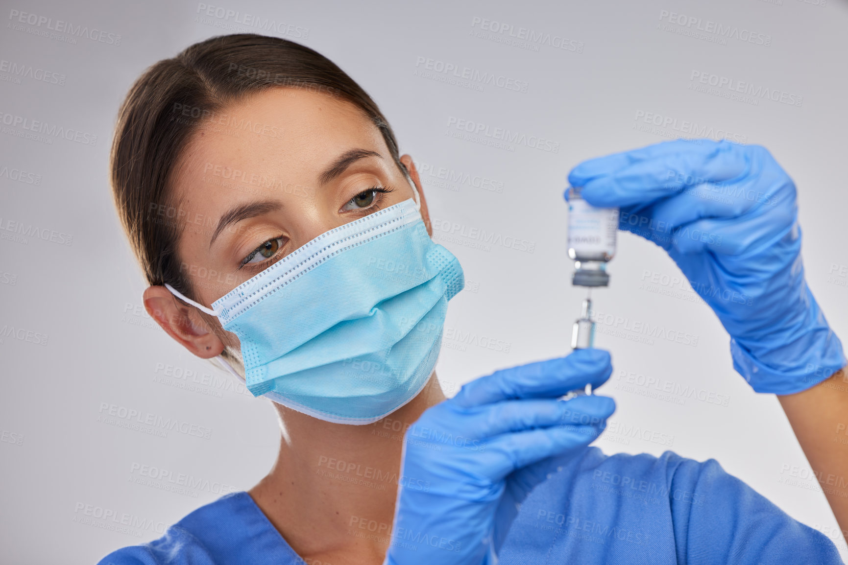 Buy stock photo Mask, nurse and woman with injection, studio and safety with wellness and medicine for healthcare. White background, medical and person with syringe, expert and healthy in clinic and vaccine on hands