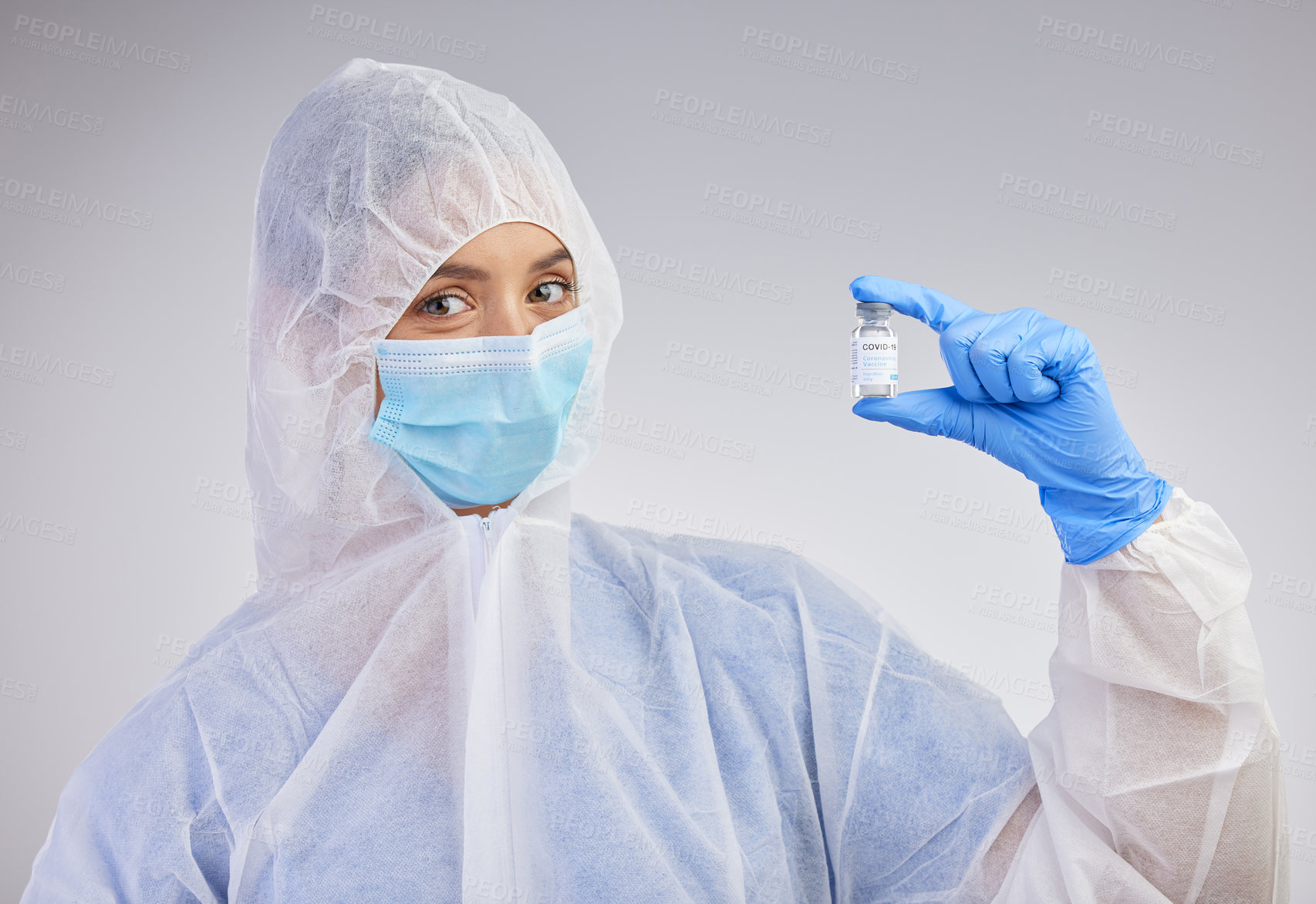 Buy stock photo Portrait, vial and nurse in ppe with mask on for safety and medical practice in white studio background. Danger, healthcare worker or female person in scrubs for viral defence and protection