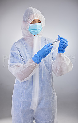 Buy stock photo Ppe, nurse and needle in white studio background for vaccination, hospital safety and medical practice. Danger, healthcare worker or female person in scrubs for viral defence, wellness and protection