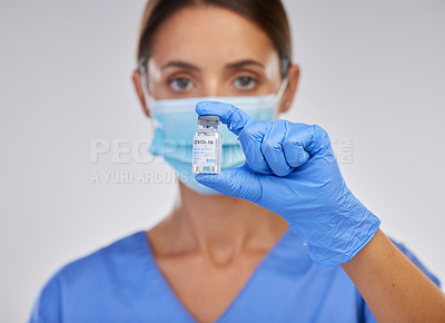 Buy stock photo Ppe, covid 19 vaccine and nurse in portrait with mask on for safety or medication in white studio background. Danger, healthcare worker or female person in scrubs for viral defence and protection