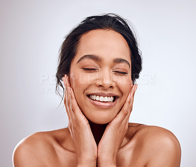 Buy stock photo Happy, beauty and hands on face of woman in studio for skincare, treatment and natural glowing skin on white background. Dermatology, wellness or Mexican model with cosmetic, shine and satisfaction