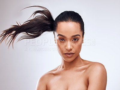 Buy stock photo Haircare, portrait and woman in studio with cosmetics, keratin treatment and growth on gray background. Movement, female person and long hair with facial for luxury, wellness and aesthetic in salon