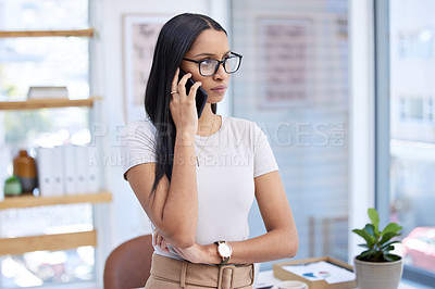 Buy stock photo Businesswoman, phone call and serious thinking in office for startup solution, communication or crisis. Female person, cellphone and networking as digital designer with thoughts, future or decision