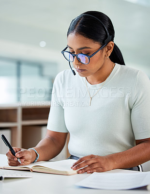 Buy stock photo Crm, woman consultant and call center writing in a office with telemarketing information. Female worker, management and document approval of a phone agent learning about company process at desk
