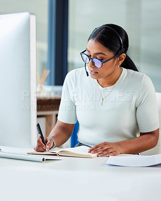 Buy stock photo Crm consultant, woman writing and call center staff in a office with telemarketing information. Worker, online management and document of a phone agent learning about company process tech at desk