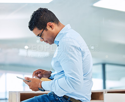 Buy stock photo Business man, tablet and browsing in office for internet connection, planning and research information. Male employee, digital technology and reading website, online data and project update on app